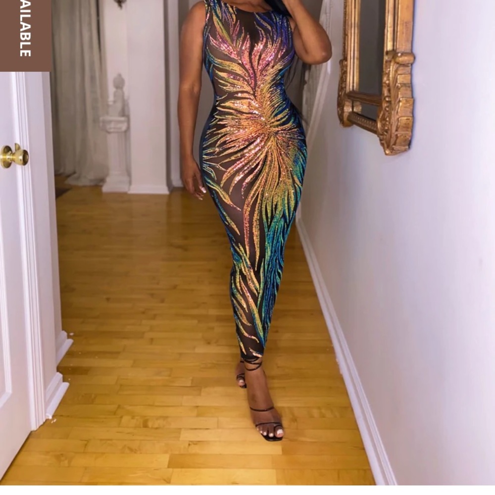 perfect mix of sequins and nylon this midi dress